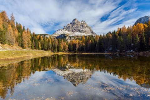 Antorno lake towards Tre Cime di Lavaredo mountain reflected in lake