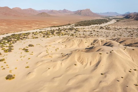 The dry bed of the Hoarusib river and adjoining badlands