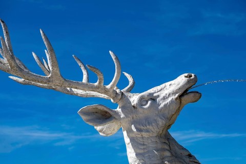Gargoyle deer figure in the palace garden at Schwetzingen Palace