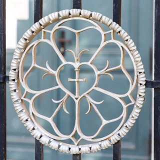 Luther rose in the wrought-iron gate in front of the Georgenkirche