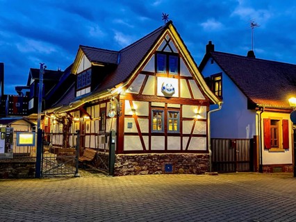 Old half-timbered house at dusk