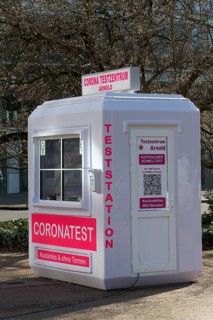 Corona test station in a container