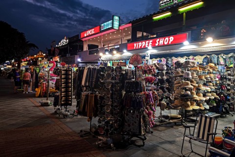 Shops and restaurants in the evening on the beach promenade