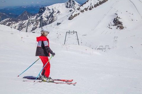 Skier on glacier ski slope Olperer