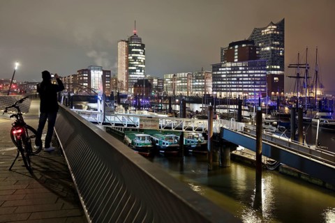 Elbe promenade with Columbus House and the Elbe Philharmonic Hall at night