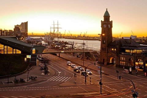Elbe Philharmonic Hall with clock tower and gauge tower at sunrise