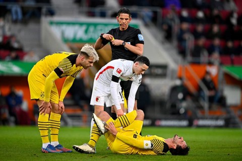 Foul by Ruben Vargas FC Augsburg FCA on Mats Hummels Borussia Dortmund BVB