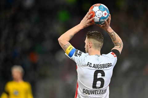 Jeffrey Gouweleeuw FC Augsburg FCA with captain's armband in the national colours of Ukraine