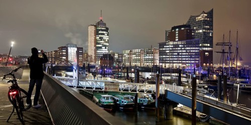 Elbe promenade with Columbus House and the Elbe Philharmonic Hall at night