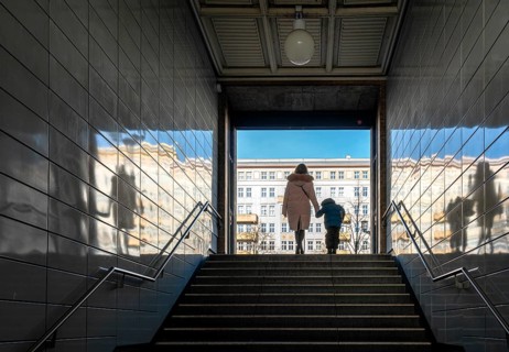 Passengers at the exit of the underground station Straussberger Platz