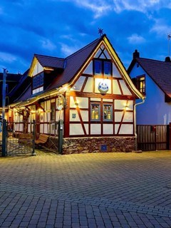Old half-timbered house at dusk