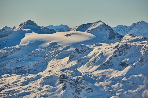 View from Mount Kitzsteinhorn on snow covered mountains