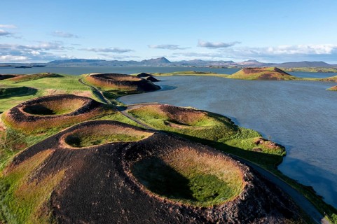 Aerial view of green volcanic crater