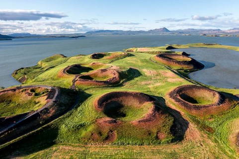 Aerial view of green volcanic crater