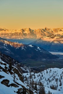 View from Mount Kitzsteinhorn on snow covered mountains down to Zell am See