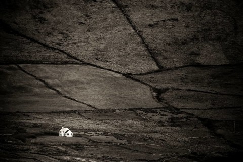 Small house in barren landscape