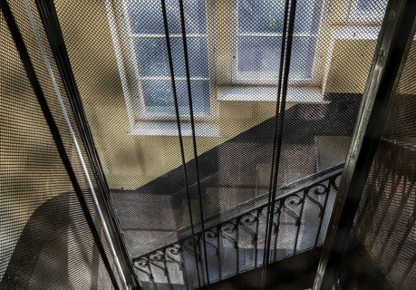 Protective grating on a historic lift shaft in an old factory