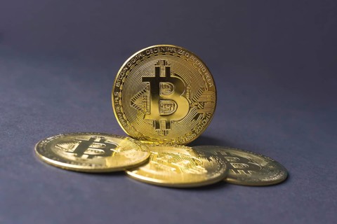 Bitcoin BTC crypto currency gold coins