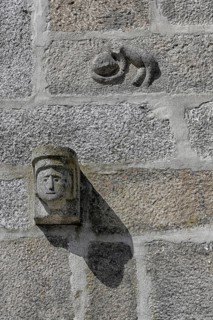Carvings on the facade of the Black Cat or Lion of Judah House