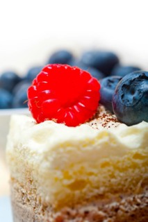 Fresh homemade raspberry and blueberry cream cake