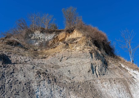 Slopes and chalk cliffs on the pebble beach of Pirate's Gorge on the island of Ruegen