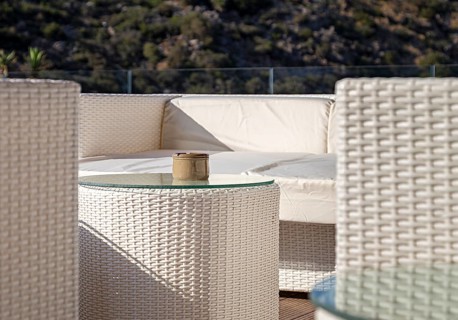 White wicker furniture on the terrace