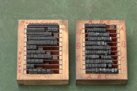 Set box with letters of a former valve factory