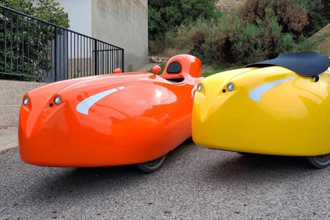 Front view of two velomobiles