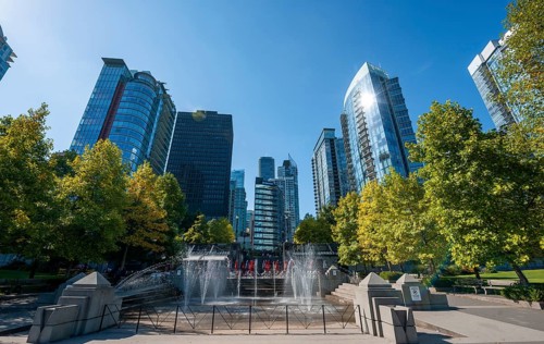 Fountain in Spray Park and SKyline with skyscrapers