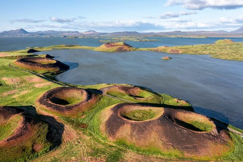 Aerial view of green volcanic crater