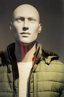 Mannequin in green quilted jacket