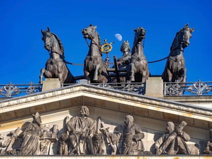The moon shines above the quadriga with the city goddess Brunonia on the reconstruction of Braunschweig Castle