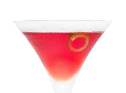 Cosmopolitan drink cocktail straight up on martini cup with lime peel isolated on white background