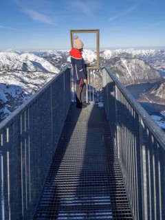 Tourist admires winter landscape at Five Fingers viewpoint
