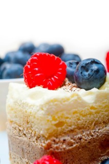 Fresh homemade raspberry and blueberry cream cake