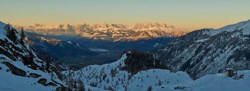 View from Mount Kitzsteinhorn on snow covered mountains down to Zell am See