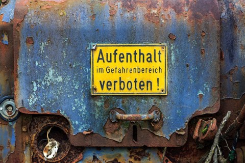 Prohibition sign on old machine door