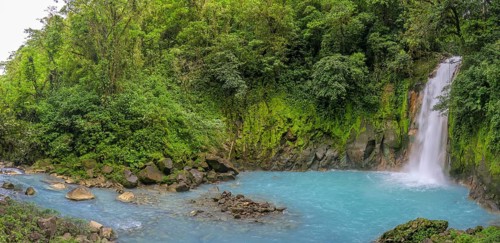 Waterfall with blue turquoise water of the Rio Celeste