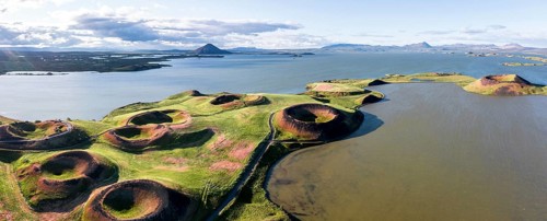 Aerial view of green volcanic crater