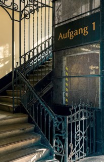 Ornate door from a historic lift in an old factory
