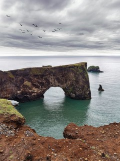 Rock gate at Cape Dyrholaey in summer
