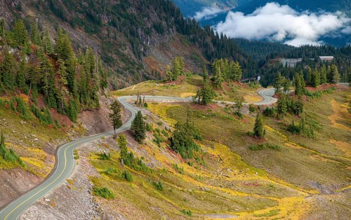 Road through autumnal mountain landscape
