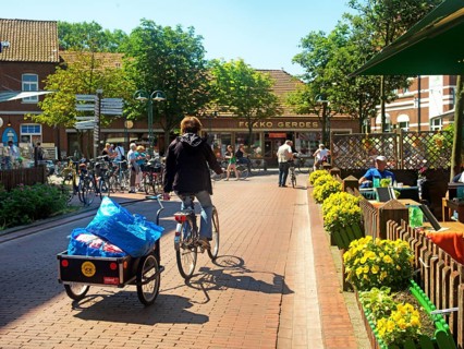 Bicycle with trailer in the centre of Langeoog
