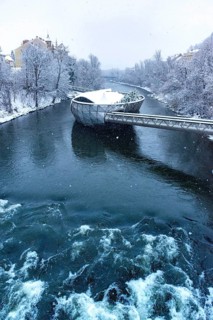Mur river with Murinsel bridge in Graz
