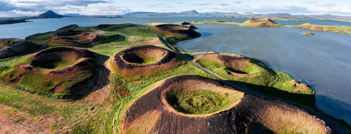 Aerial view of green volcanic crater