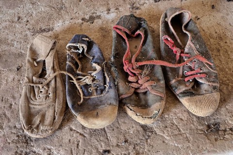 Rotten casual shoes on the floor