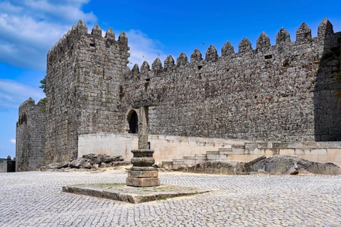 Cross next to castle walls