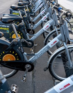 Electric rental bikes at the charging station in front of the Berlin House of Representatives