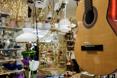 Guitar and miscellaneous for sale at a flea market