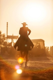 A man in sombrero on his horse